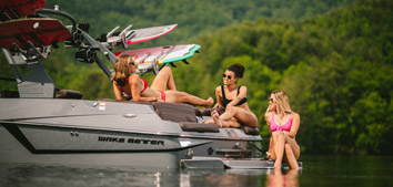 People having a good time on a Malibu wakeboard boat